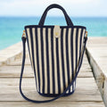 Bolso azul y blanco mediano