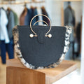 Bolso con piel