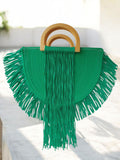 Bolso medio con asas de madera y flecos verdes