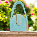 Bolso pequeño oval turquez con gris